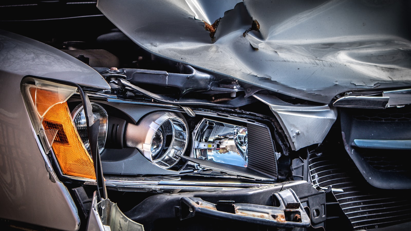 The crushed front end of a car after a collision